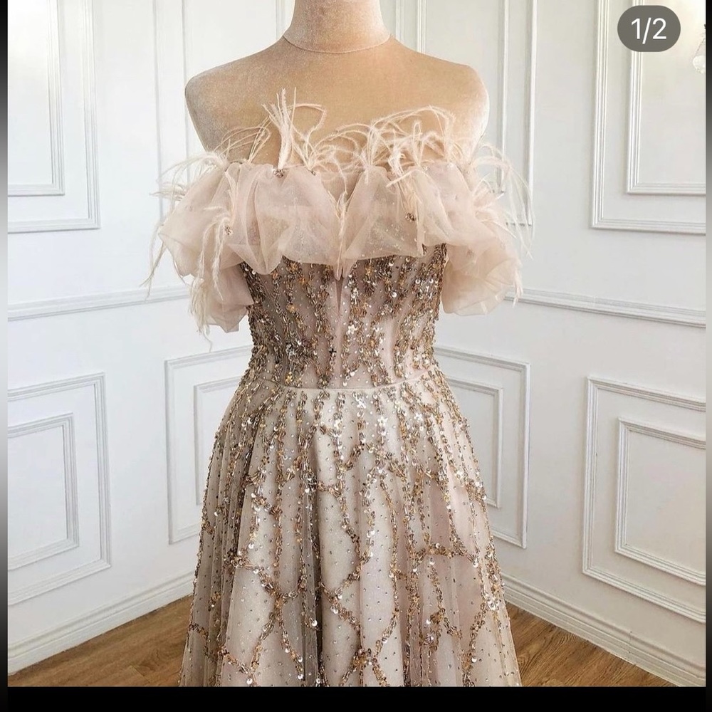 Fancy beaded feather dress ball gown never worn perfect condition size 4